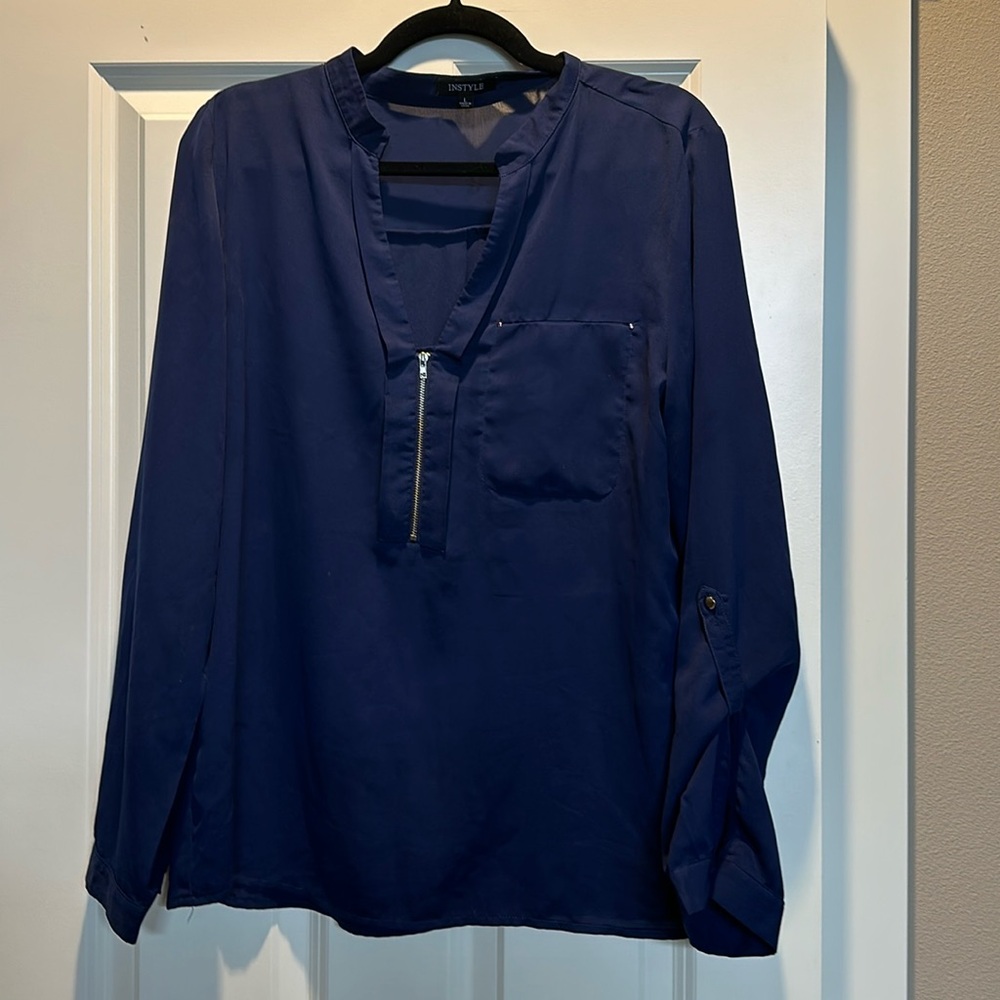 Cute blue top in large.